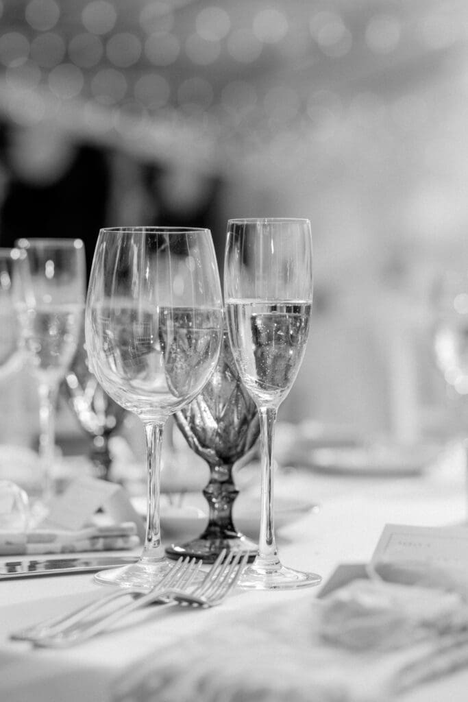 wine glasses on a table setting