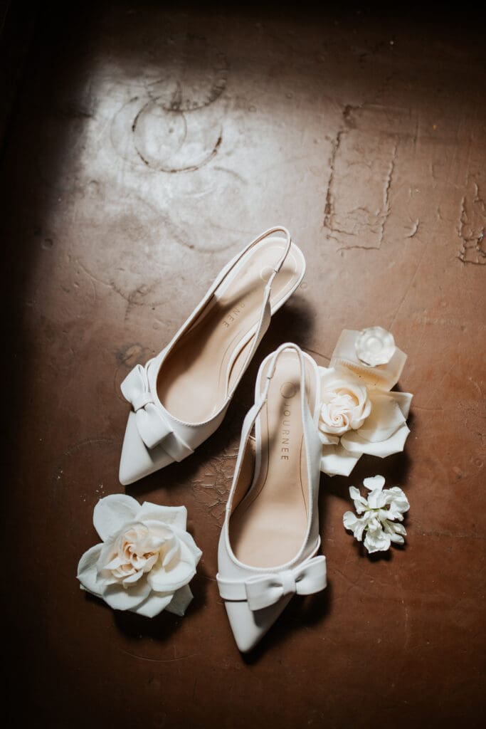 detail shot of brides shoes at Gesu Catholic Church in Detroit Michigan