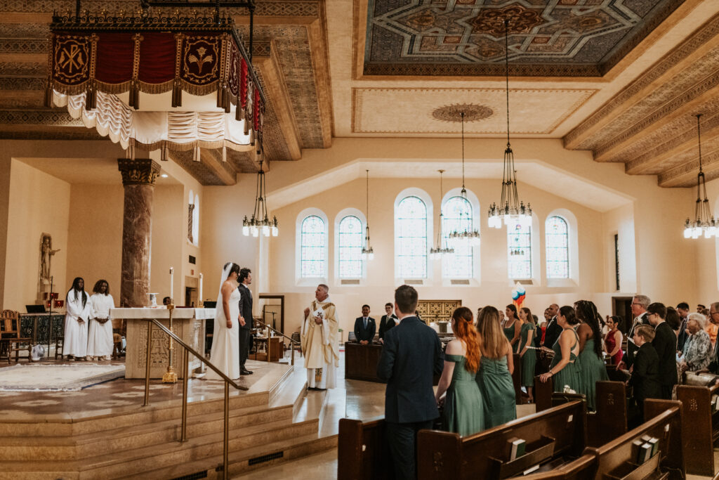 Interior of Gesu Catholic Church Detroit during Catholic wedding ceremony