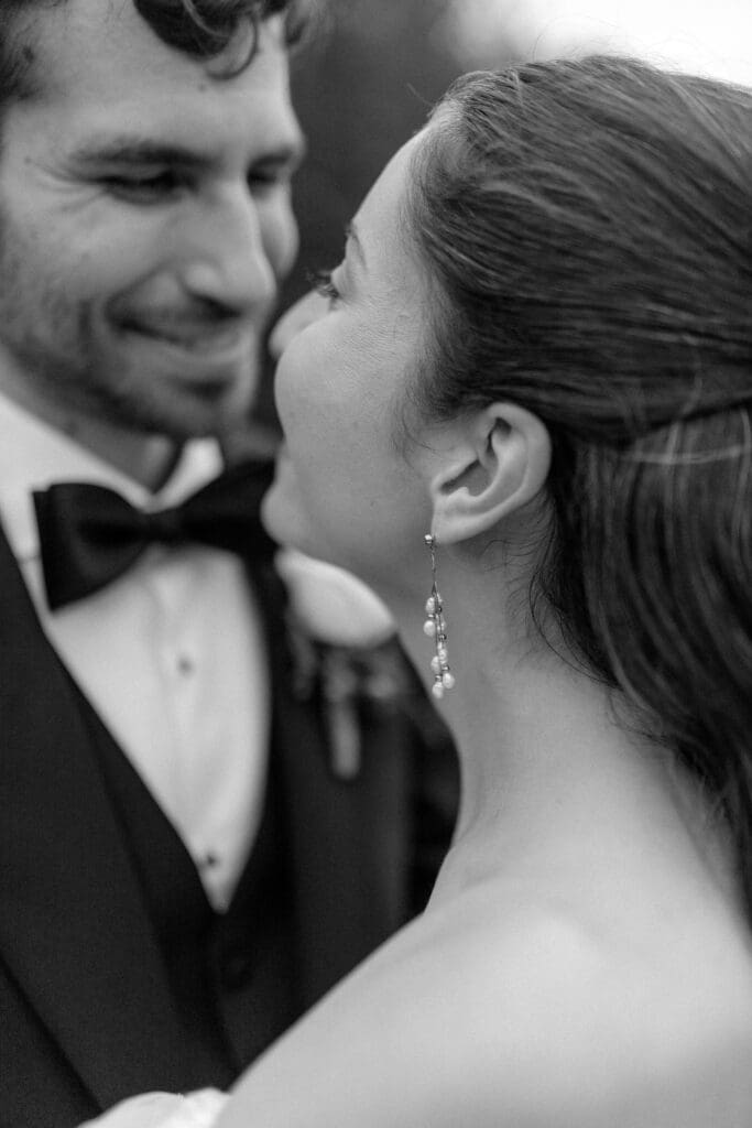 closeup of a bride looking sweetly into her new husband's eyes