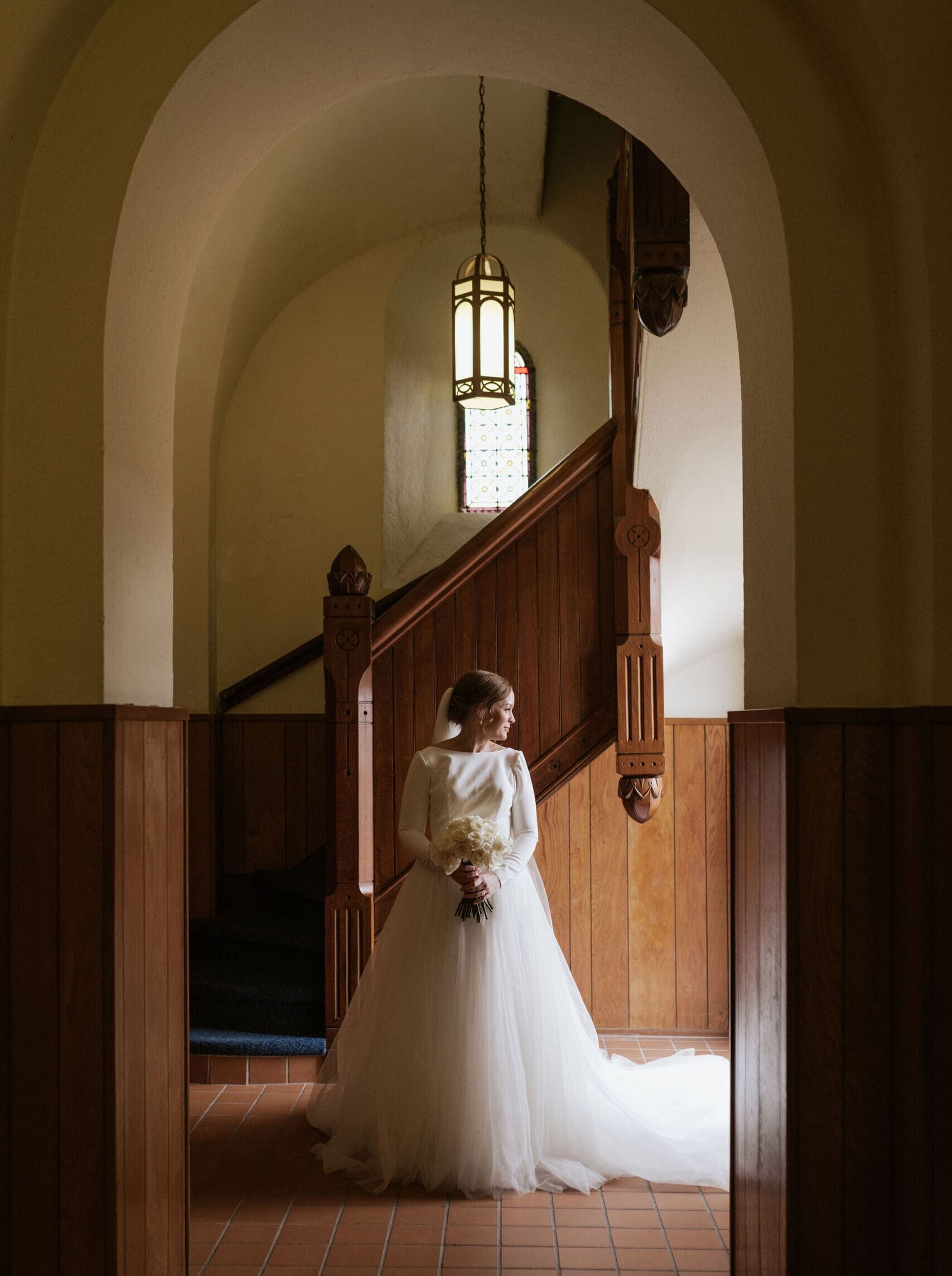 A bridal portrait in the entryway of Saint Benedict's parish in Atchison Kansas