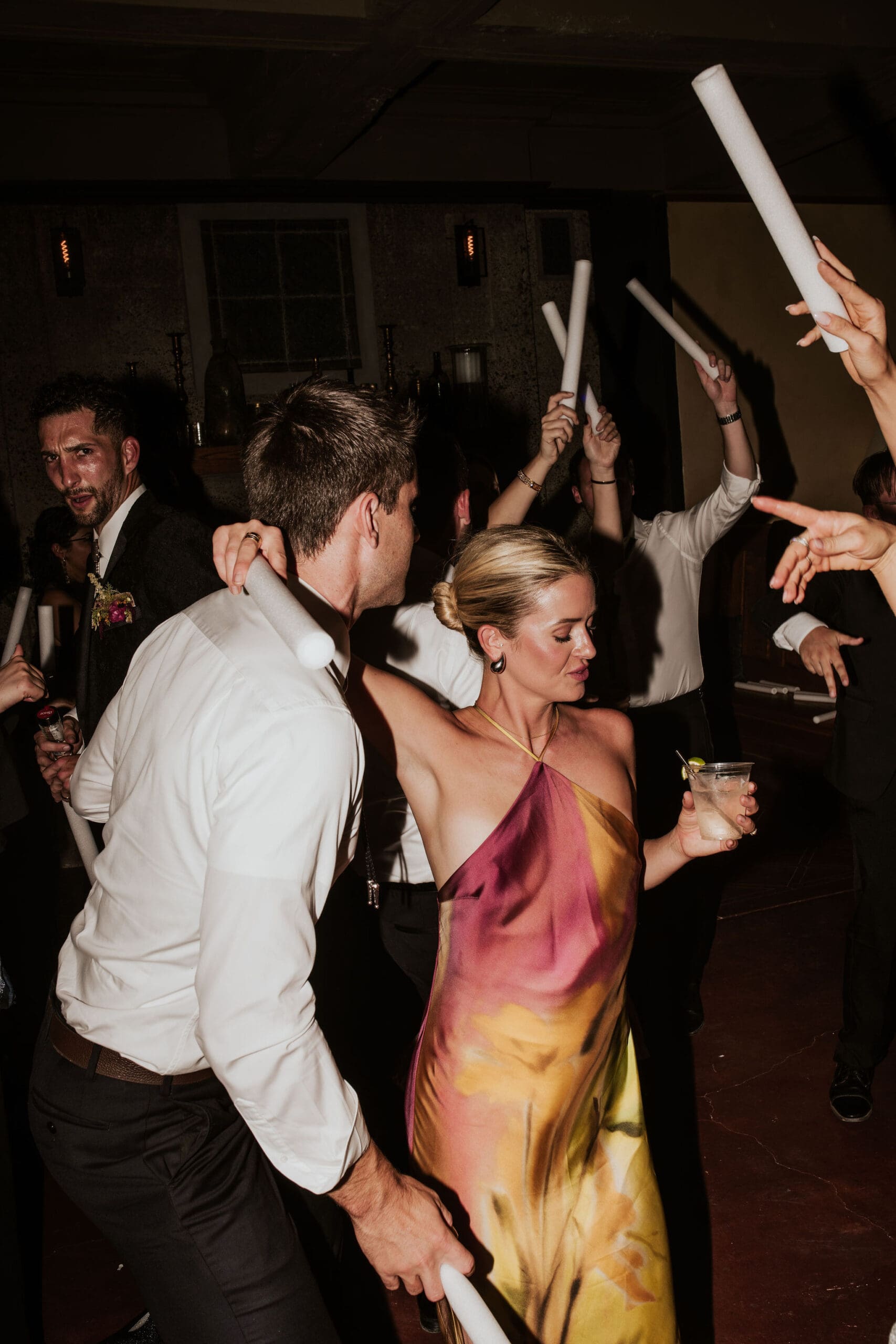 direct flash party vibes during a wedding reception