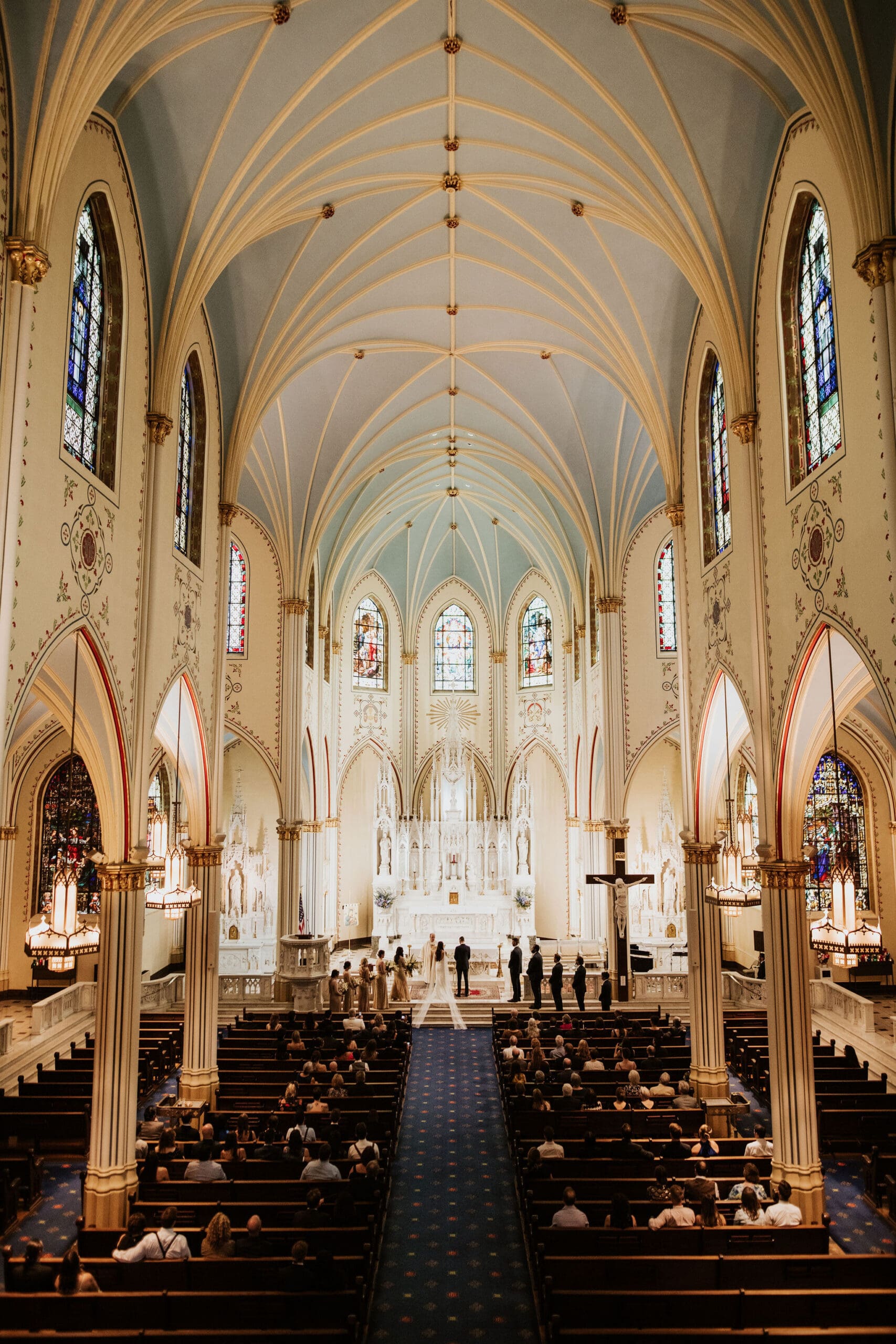 gold and cream altar details inside Our Lady of Perpetual Help Catholic Church