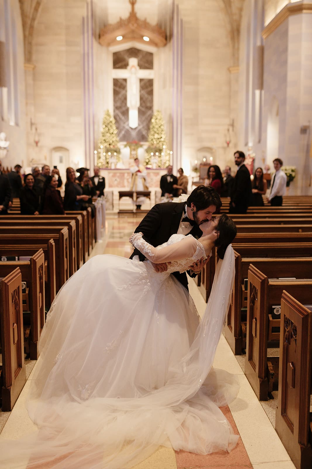 washington dc wedding photos couple first kiss in st ann’s catholic church