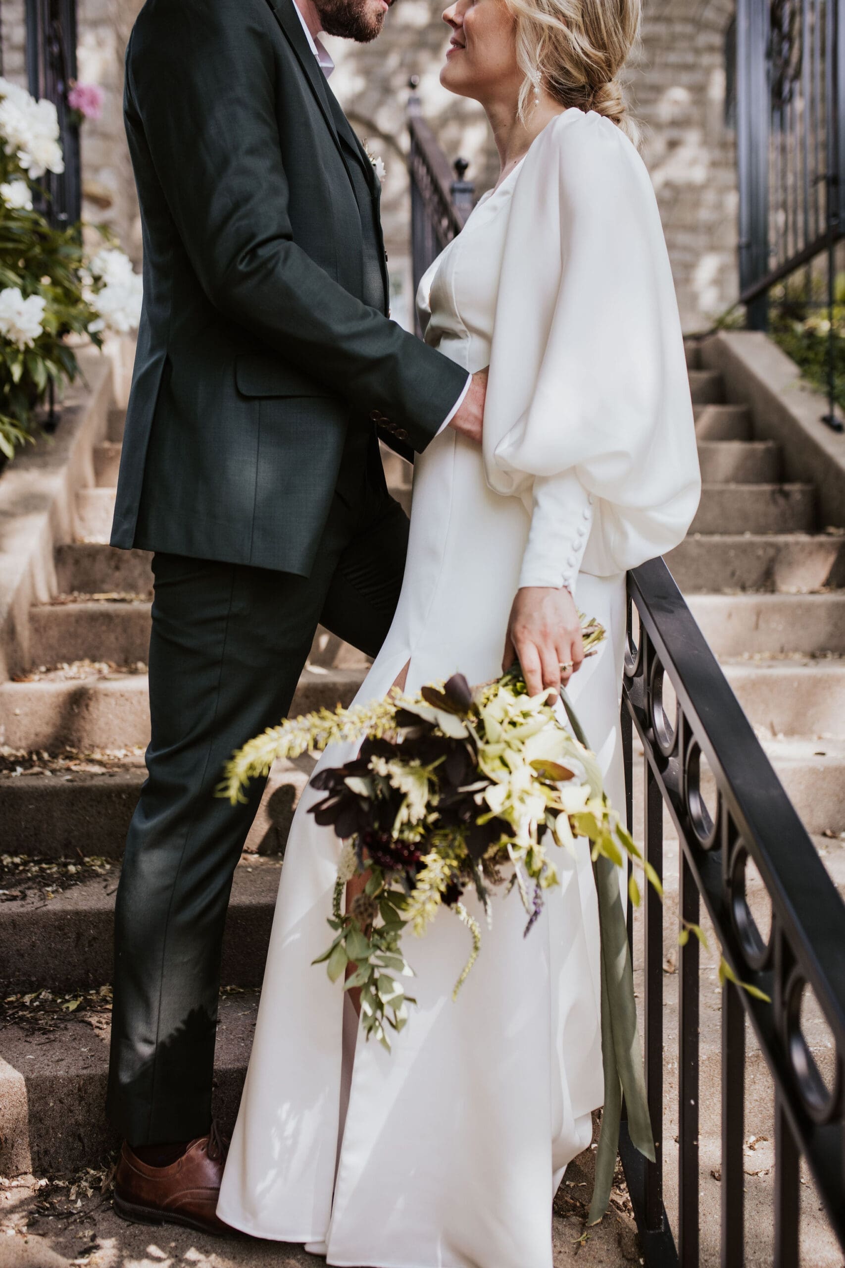 Bride and groom portrait taken outside Holy Trinity Catholic Church Weston MO