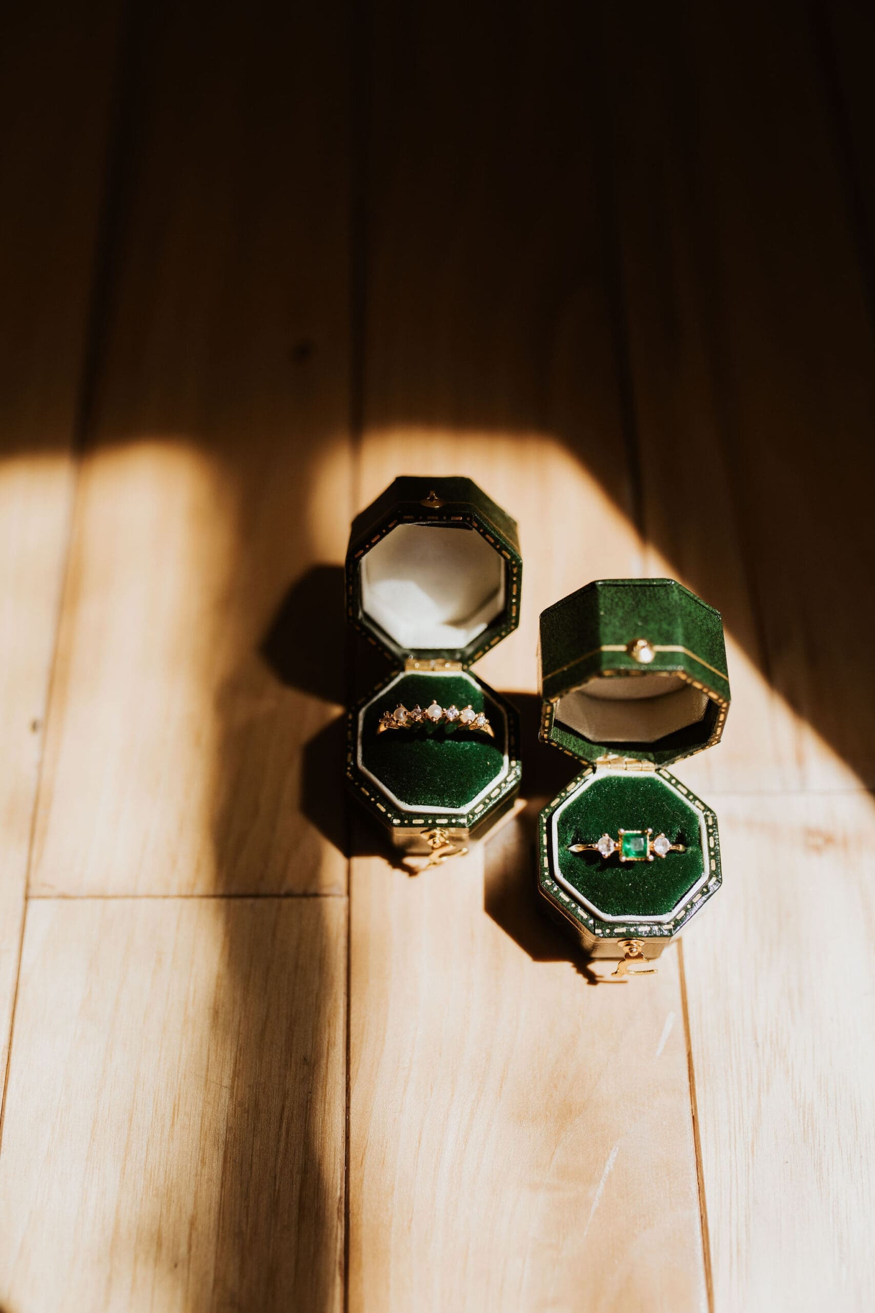 Unique bride and groom rings in antique green velvet ring boxes