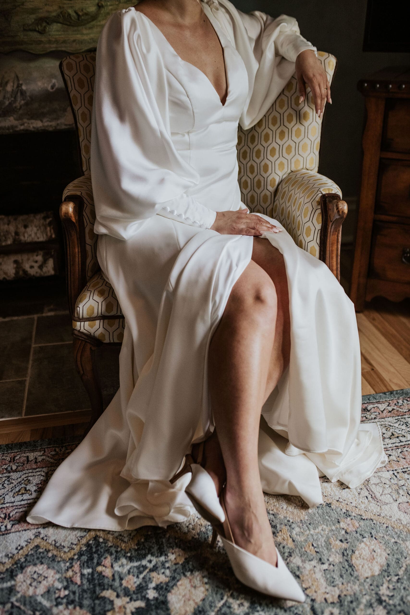 An elegant bride getting ready in her customized wedding dress in a wedding venue Weston MO